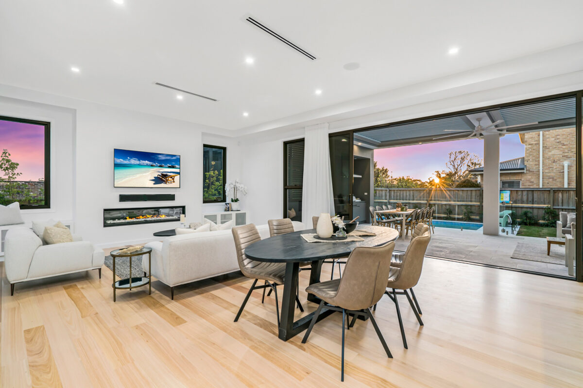 Glenhaven Contemporary: open plan dining and living seamlessly flowing outdoors