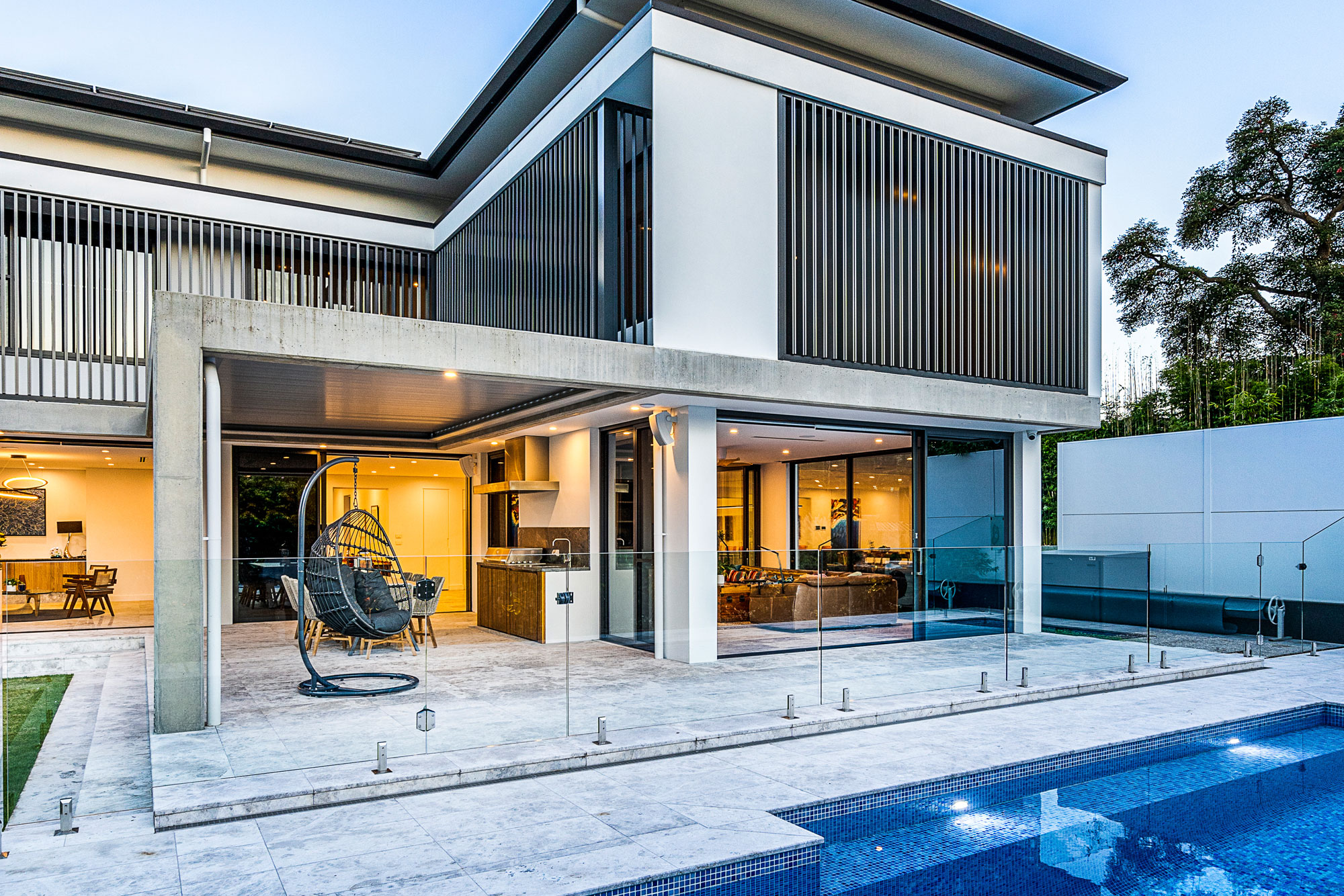 Beecroft Ultra Modern: modern view of house from backyard with pool