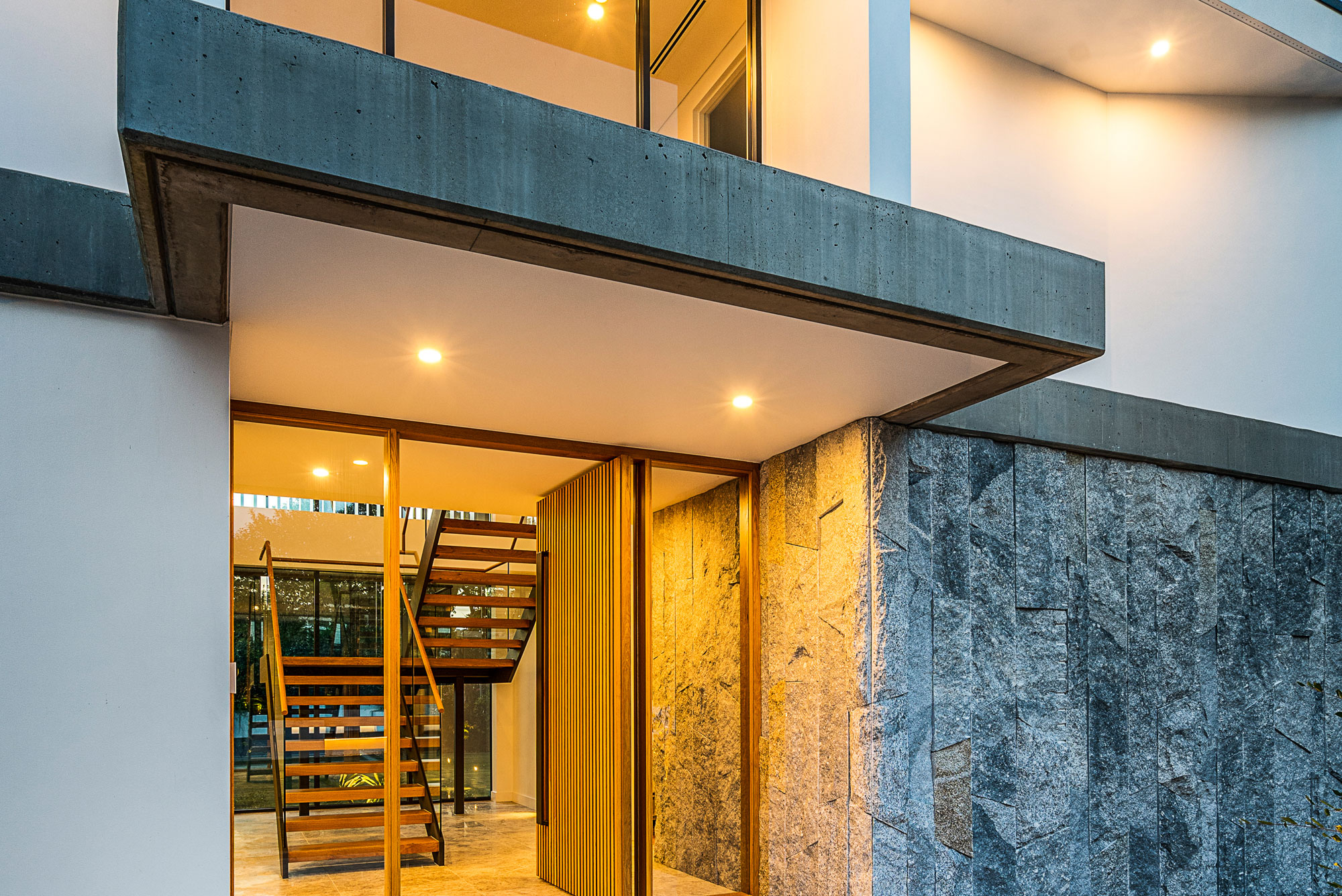 Beecroft Ultra Modern: stylish entrance to floating staircases, framed by glass
