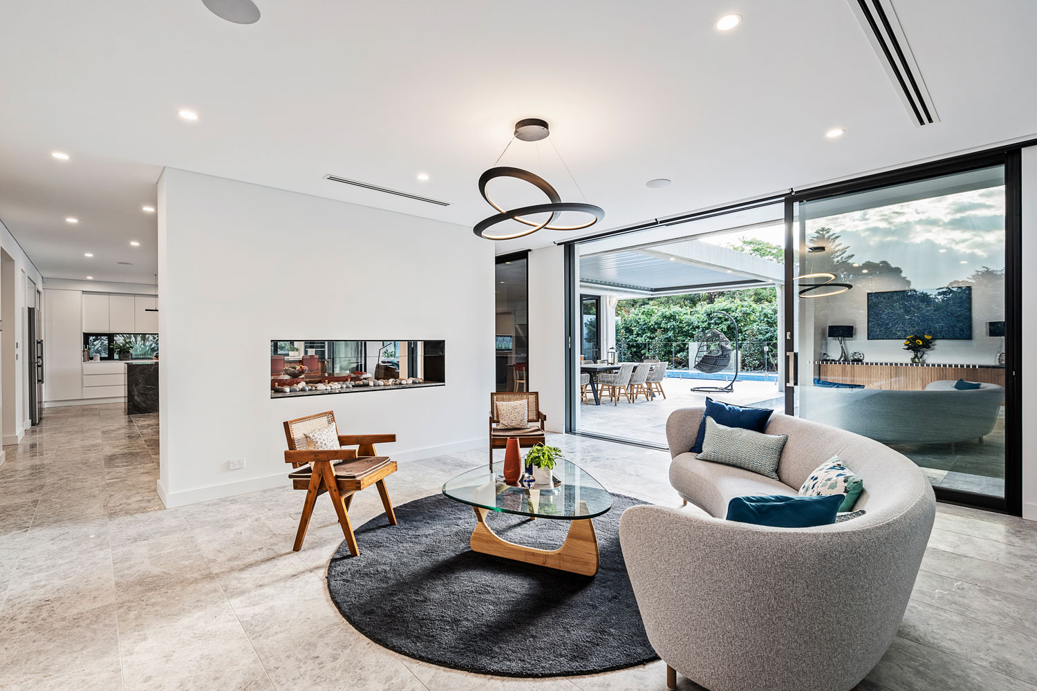 Beecroft Ultra Modern: casual sitting area flowing to outdoor living