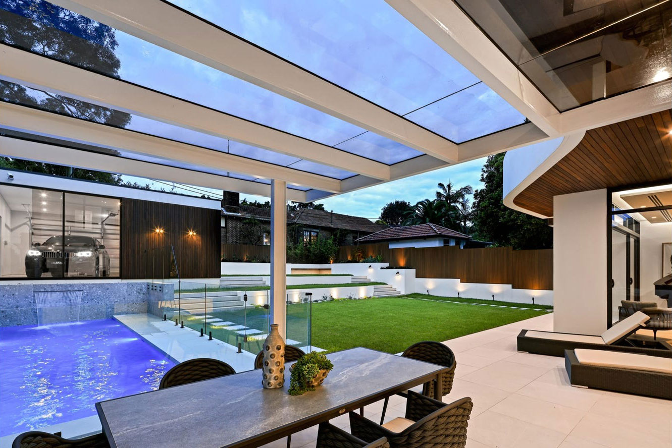 Greenwich Ultra Modern: outdoor living looking onto backyard and garage