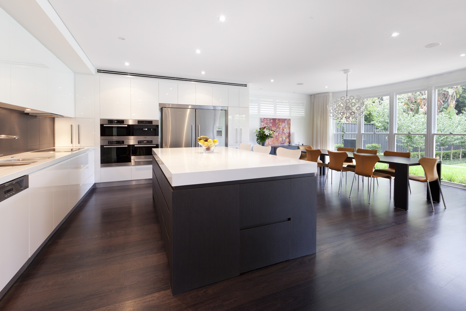 Hunters Hill Modern Traditional: kitchen and dining looking out to backyard