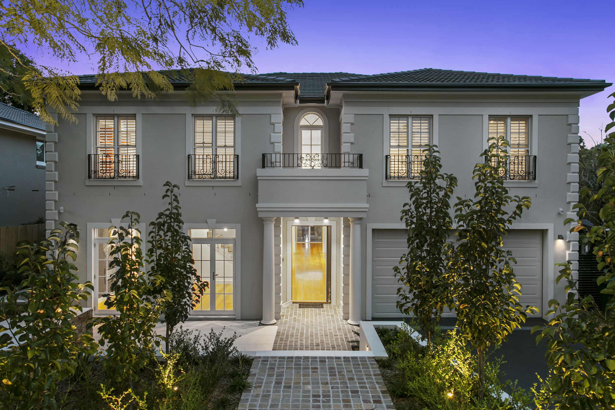 North Wahroonga: house exterior lit at dusk