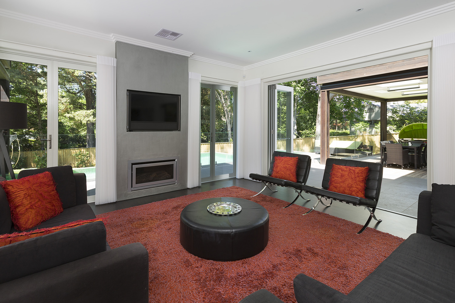 Warrawee Neo-Georgian: living area with red carpet and accents