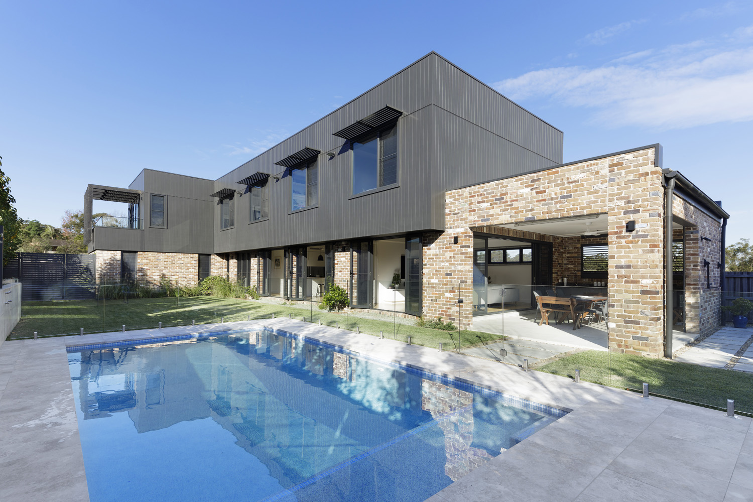 Glenhaven Contemporary Industrial: stylish exterior with pool
