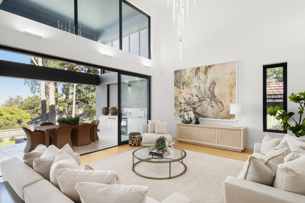 Greenwich Contemporary: living space with extra high ceilings looking out onto outdoor living