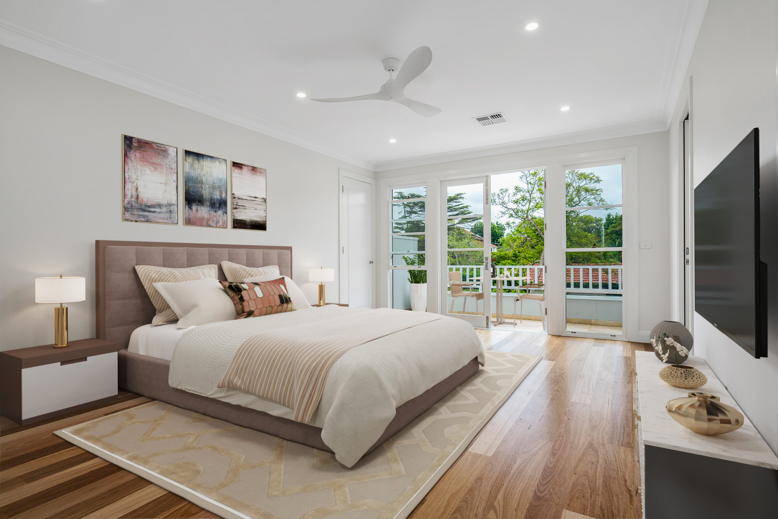 Spacious main bedroom with timber flooring, balcony access and a leafy outlook.